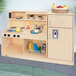 A Whitney Brothers wooden toddler kitchen with a sink and stove.