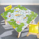 A Whitney Brothers square wood table with a pond and fish on it.