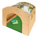 A wooden toy house with a green cover and a book inside.