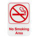 A red and white sign with a red circle and text reading "no smoking"