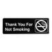 A black and white sign that says "Thank You For Not Smoking" with white text on a white background.