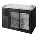 A black True back bar refrigerator with glass doors.
