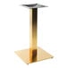 A gold square pedestal for an Art Marble Furniture bar height table.