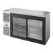 A True stainless steel back bar refrigerator with two sliding glass doors.