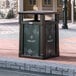 A Suncast Java rectangular outdoor waste container with white sign frames on it.