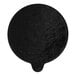 A black circle with a white background on a table.