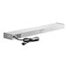 A white metal ServIt strip warmer with a black power cord.