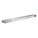 A long rectangular metal shelf with red buttons.