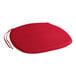 A red Lancaster Table & Seating round chair cushion with ties.