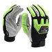 A close-up of a pair of Cordova CALIBER-GT Spandex Driver's Gloves with green and black accents.