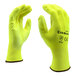 A close-up of a pair of yellow Cordova warehouse gloves with yellow polyurethane palms.