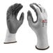 A close-up of a pair of Cordova white nylon gloves with gray foam palm coating.