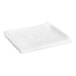 A white Garnier-Thiebaut king size pillow protector folded on a white surface.