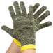 A pair of Cordova cut-resistant gloves with yellow and black stripes and yellow sleeves.