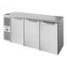 A stainless steel True back bar refrigerator with three solid doors.