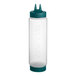 A clear plastic Vollrath Traex squeeze bottle with a green Twin Tip cap.