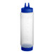 A Vollrath Traex clear plastic squeeze bottle with blue and white lids.