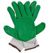 A pair of small green gloves with white trim and green latex palms.