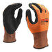 A close-up of a pair of small Cordova Commander orange and black gloves with black foam nitrile palms.