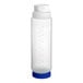 A Vollrath Traex clear plastic squeeze bottle with blue and white caps.