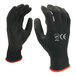 A pair of extra large black Cordova nylon gloves with black polyurethane palms.