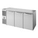 A True stainless steel back bar refrigerator with solid doors.