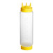 A clear plastic Vollrath Traex squeeze bottle with a yellow cap and base.