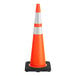 An Xpose Safety orange and white traffic cone on a black base.