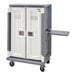 A white and grey plastic storage container with a granite gray Cambro end table on a cart shelf.