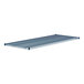 A blue metal Lavex Pro NSF wire shelf.