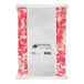 A bag of Albanese Lovestruck gummi bears with pink and white candy inside.