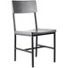 A BFM Seating Memphis black steel side chair with a gray wooden back and seat.