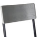 A BFM Seating Memphis grey wooden side chair with black steel legs.