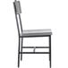 A BFM Seating Memphis side chair with a gray wooden back and seat and black steel frame.