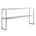 A stainless steel Avantco double deck overshelf with metal legs and railings.