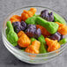 A bowl of Albanese Spooktacular Gummi candy on a table.