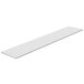 A long rectangular white cutting board.