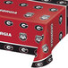 A red and black University of Georgia Bulldogs table cover with black and white logos.