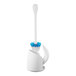 An OXO Good Grips white toilet bowl brush in a white caddy with a black handle.