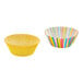 A couple of colorful paper Wilton cupcake liners with stripes in different colors.