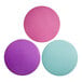 Three corrugated cake circles in pink, purple, and blue.