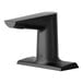 A T&S WaveCrest matte black deck mount sensor faucet on a counter.