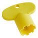 A yellow plastic T&S Vandal-Resistant Aerator Key with a hole in it.