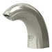 A T&S WaveCrest brushed nickel deck mount sensor faucet with a curved spout.