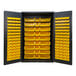 A large black metal cabinet with yellow bins.