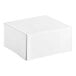A white Wilton bakery box with a fold-over lid.