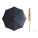 A black umbrella with a wooden pole and pulley lift.