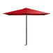 A close up of a red Lancaster Table & Seating umbrella with a black pole.