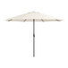 A white umbrella with black poles and a crank lift.