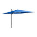 A blue Lancaster Table & Seating cantilever umbrella on a metal pole.